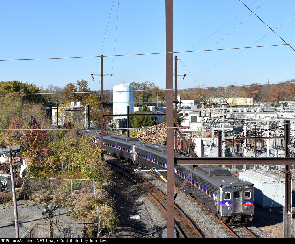 Septa Silverliner IV Cab Car # 308 bringing up the rear as the train leaves the NTC Station behind